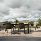 Patio Chair no. One S2 i olivengrøn og sort med to formstøbte skaller og pulverlakeret stel.
