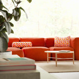 Soft Sofa Indoor loungers in orange jacquard fabric with geometric pattern, modular and soft design.