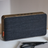 Move Wood Bluetooth højtaler i naturlig egetræ med Fiord tekstil fra Kvadrat og messingdetaljer.