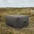Soft Sofa Outdoor pouf i Kirra Olive med blødt, rundt design til udendørs brug.
