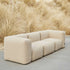 Udendørs Soft Sofa Outdoor 3-personers i beige bouclé med bløde puder og lav ryg.