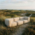 Udendørs 3-personers Soft Sofa Outdoor i beige boucle stof med bløde puder og lav ryg.