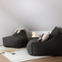 Cobana Lounge Chair i gråt stof med formstabilt design og ryglæn, velegnet til både inde og ude.