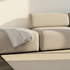 Fjord Sofa Pouf i blødt Cosmo Beige stof med afrundede kanter og skandinavisk design.