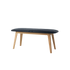Nordic Bench i massivt egetræ med sort Terra læderpolstring og glat finish.