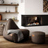 Canvas Lounge Chair og puf i petrol canvas stof med ryglæn og rund puf ved siden af