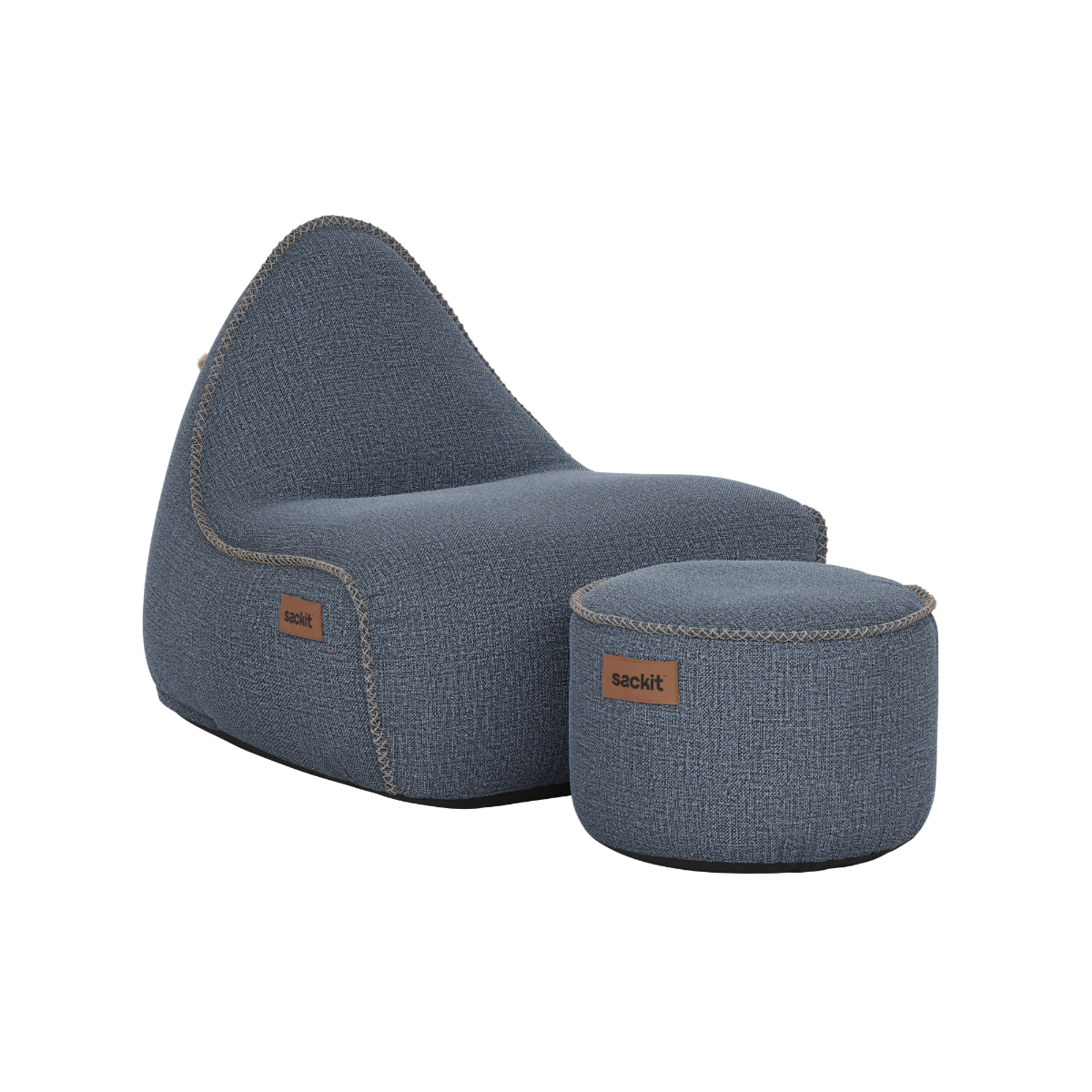 Cobana Lounge Chair and Pouf in Kirra Indigo color with soft fabric and relaxed shape.