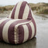 SACKit Chair Outdoor sækkestol i rund form og Renesse Chestnut farve med sort bund og PU-læderstrop.