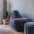 Multifarvet Lounge Chair Paul Smith Limited Edition i bomuld med matchende puf i moderne dansk design.
