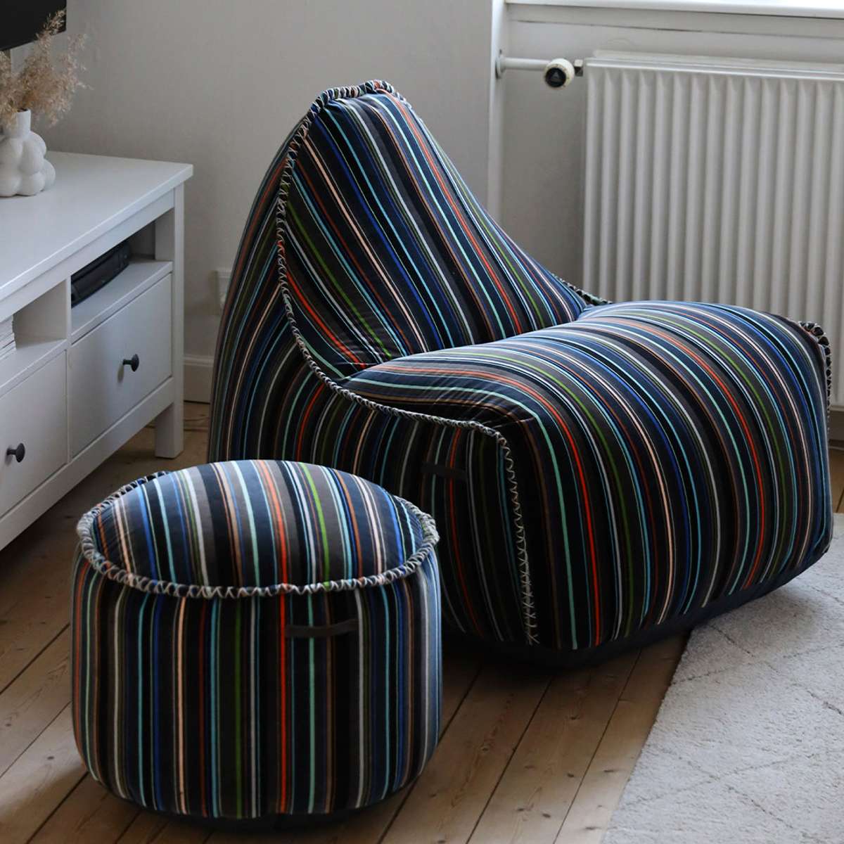 Multifarvet Pouf Paul Smith i bomuld med lineært design, rund form, lav højde.