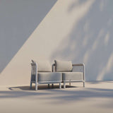 Kirra Lounge Sofa hjørnemodul i Kirra Sand med pulverlakeret aluminiumsramme og Olefin tekstil til udendørs brug.