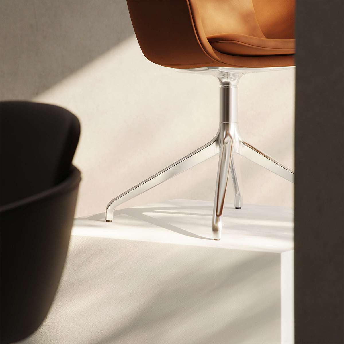 Chair no. One S2 swivel chair in Terra Black leather with polished aluminum base.