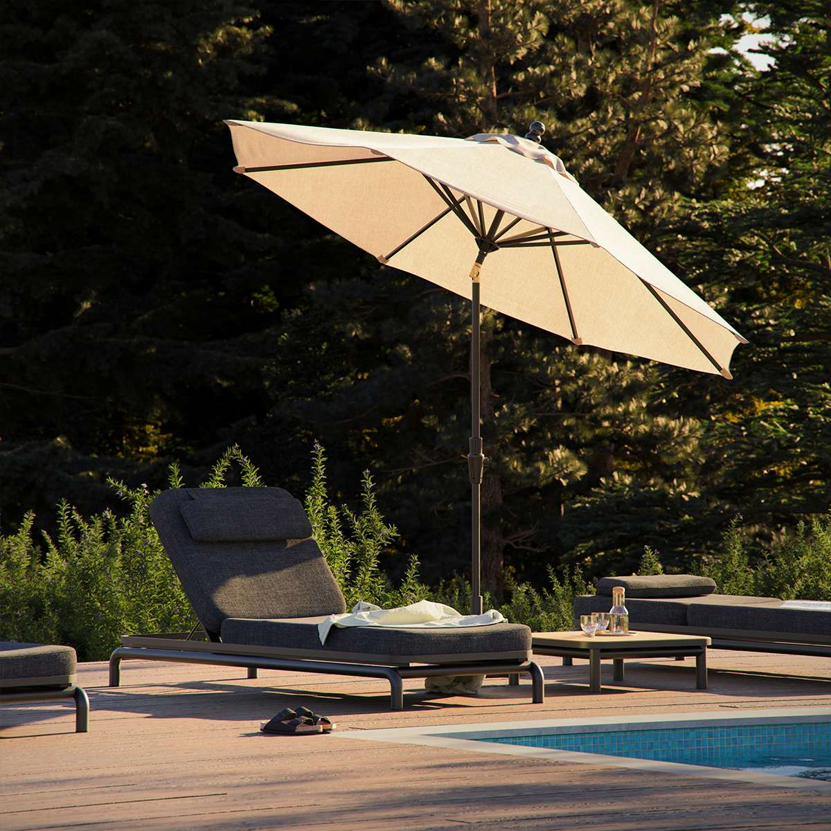 Kirra Sunbed hængekøje og solseng i sandfarvet olefin med aluminiumsramme i udendørsmiljø.