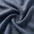 Nærbillede af mørkeblåt slidstærkt tekstil med vævet struktur til en vejrbestandig udendørs loungesofa fra sackit designet i Danmark