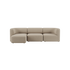 Beige Fjord sofa fra sackit med tre siddepladser og venstrevendt chaiselong i bløde afrundede former på sort baggrund